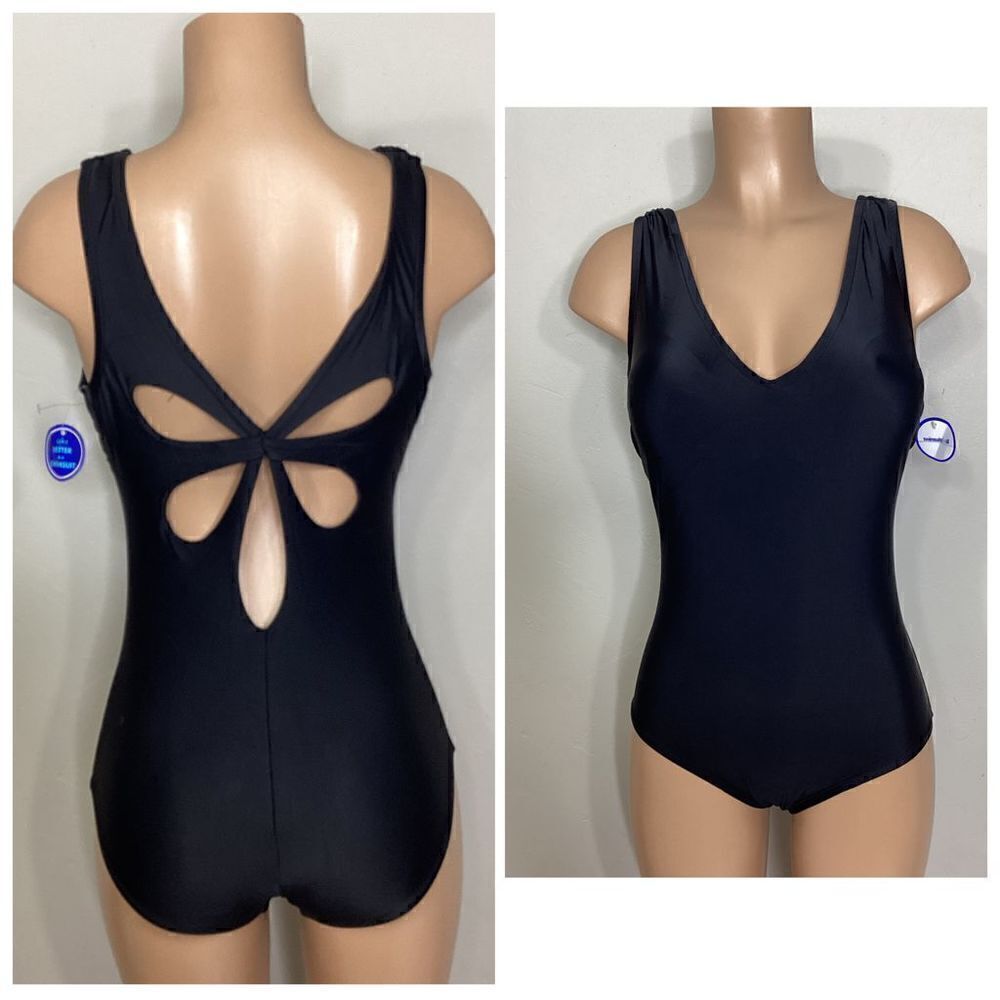 New. Black v-neck body sculpting swimsuit. Size 10